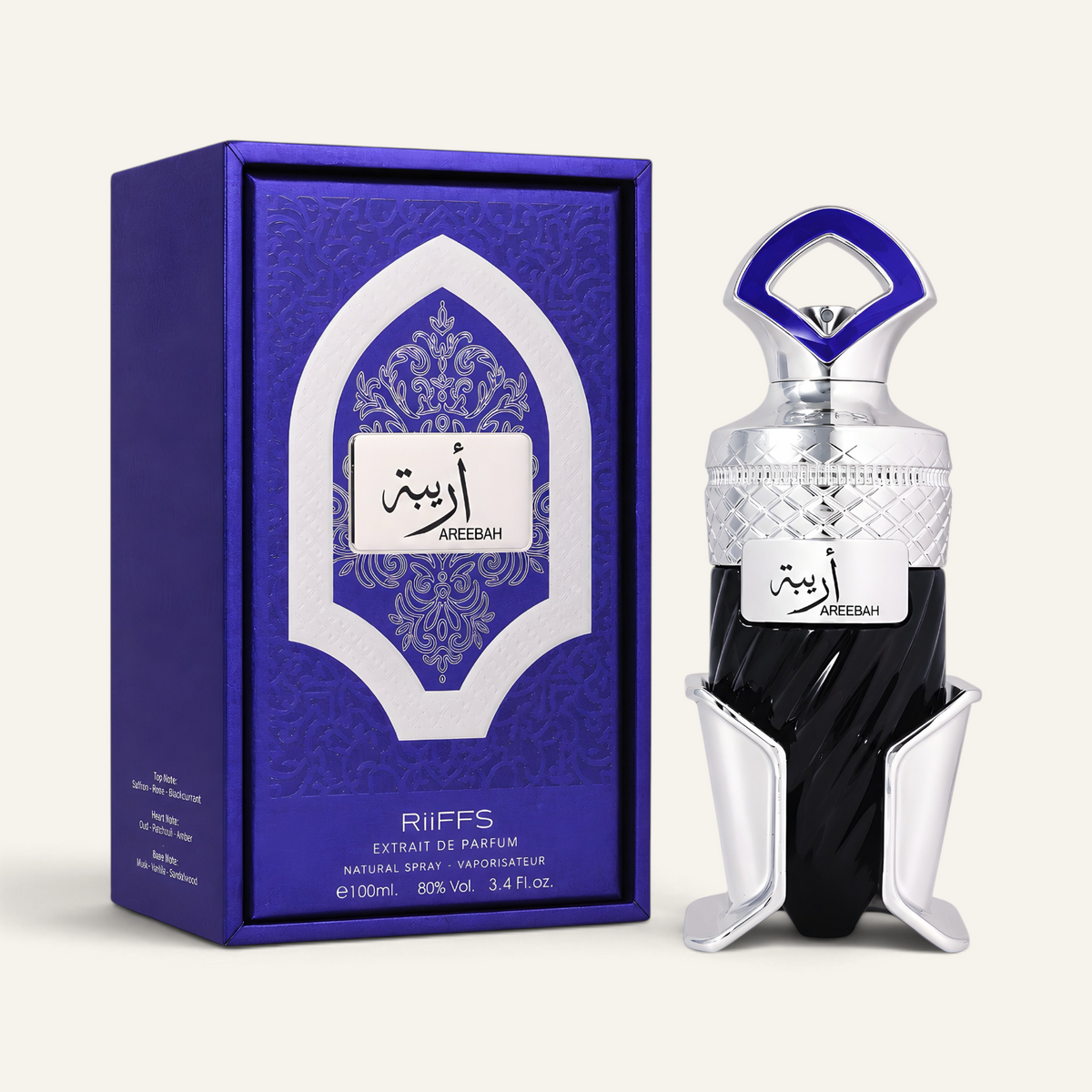 Profumo unisex Areebah di Riiffs in flacone nero e argento con scatola blu decorata, selezionato da NOOR Arabian Essence