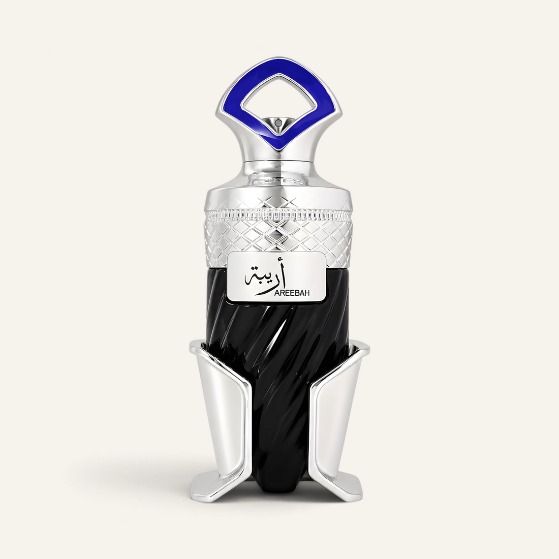 Profumo unisex Areebah di NOOR Arabian Essence in flacone nero con dettagli argento e tappo blu su sfondo chiaro