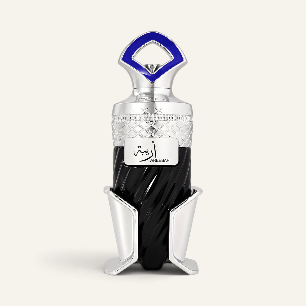 Profumo unisex Areebah di NOOR Arabian Essence in flacone nero con dettagli argento e tappo blu su sfondo chiaro