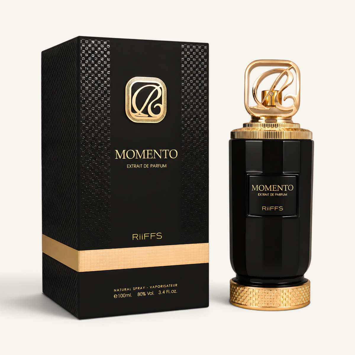 Profumo unisex Momento di NOOR Arabian Essence in flacone nero e oro con scatola elegante su sfondo neutro