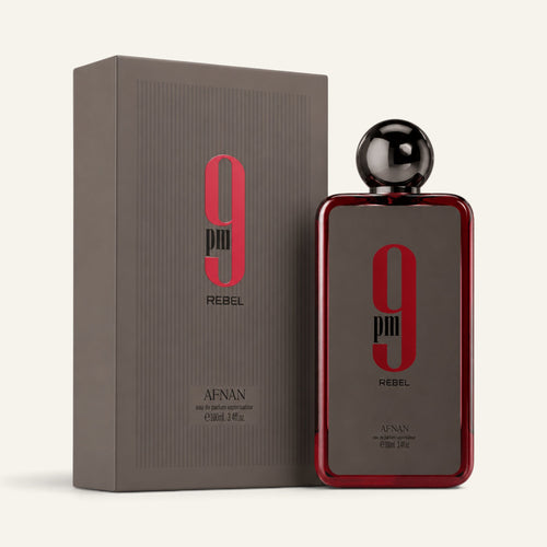 Profumo unisex 9PM Rebel di Afnan selezionato da NOOR Arabian Essence in flacone rettangolare con dettagli rossi